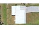 Aerial view of the home showing the roof and driveway at 4859 Foxwood Blvd, Lakeland, FL 33810