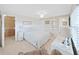 Well-lit bedroom with ceiling fan and views into ensuite bathroom and closet at 4859 Foxwood Blvd, Lakeland, FL 33810