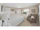 Bright bedroom featuring a ceiling fan and TV atop a white dresser at 4859 Foxwood Blvd, Lakeland, FL 33810