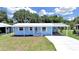 Charming single-story home with a carport and well-maintained front yard at 4859 Foxwood Blvd, Lakeland, FL 33810