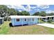 Charming single-story home with a carport and well-maintained front yard at 4859 Foxwood Blvd, Lakeland, FL 33810