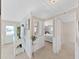 Hallway with views to the front door and living areas at 4859 Foxwood Blvd, Lakeland, FL 33810