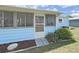 A home with a screened in porch and walkway at 4859 Foxwood Blvd, Lakeland, FL 33810