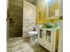 Bright bathroom featuring a standing shower and a vanity with sink at 5005 Pebble Beach Blvd, Winter Haven, FL 33884
