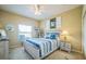 Bedroom with a comfortable bed and neutral walls at 5005 Pebble Beach Blvd, Winter Haven, FL 33884