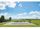 Outdoor chess set overlooking the lake; a perfect community amenity at 5005 Pebble Beach Blvd, Winter Haven, FL 33884