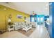 Inviting living room with comfortable seating, stylish decor, and an open layout for entertaining at 5005 Pebble Beach Blvd, Winter Haven, FL 33884