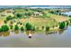 Stunning lakefront property with a private dock and expansive grounds at 501 Adams Barn Rd, Auburndale, FL 33823