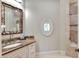 Bathroom featuring a vanity, and walk-in shower at 501 Adams Barn Rd, Auburndale, FL 33823