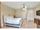 This bedroom features neutral walls, plush white bedding and convenient closet space at 501 Adams Barn Rd, Auburndale, FL 33823