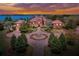 Stunning waterfront home boasts mature landscaping and a circular driveway with center water feature at 501 Adams Barn Rd, Auburndale, FL 33823
