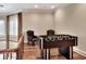 Spacious game room features a foosball table, sitting area, and a beautiful view at 501 Adams Barn Rd, Auburndale, FL 33823
