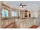 Large kitchen with granite counters and stainless steel appliances at 501 Adams Barn Rd, Auburndale, FL 33823