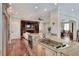 Chef's kitchen with granite counters, center island, and access to the main living areas at 501 Adams Barn Rd, Auburndale, FL 33823