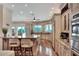 Elegant kitchen featuring an island and stainless steel appliances at 501 Adams Barn Rd, Auburndale, FL 33823