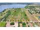 Large acreage property with privacy, mature trees, farmland and lake access at 501 Adams Barn Rd, Auburndale, FL 33823