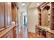 Walk-in closet and dressing area with wood built-ins and hardwood floors at 501 Adams Barn Rd, Auburndale, FL 33823