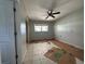 Bright room featuring tile floors, natural light, and access to an ensuite bathroom at 502 Canal Dr, Lake Wales, FL 33859