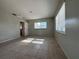 Bedroom featuring tile flooring, neutral walls, and natural light streaming through the windows at 502 Canal Dr, Lake Wales, FL 33859