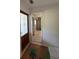 Inviting entryway with tile flooring and a doorway leading into the home's interior, awaiting personalization at 502 Canal Dr, Lake Wales, FL 33859