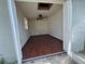 Interior shot of shed with wood floor, ceiling fan, and window at 502 Canal Dr, Lake Wales, FL 33859