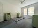Spacious bedroom with ceiling fan and natural light at 504 W 7Th St, Frostproof, FL 33843
