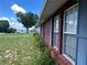 View of the lake from the windows of this lovely single story brick home at 504 W 7Th St, Frostproof, FL 33843
