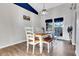 Light and airy dining room with modern lighting and sliding glass doors at 505 8Th S St, Dundee, FL 33838