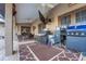Outdoor patio with comfortable seating and a large TV, perfect for entertainment at 505 8Th S St, Dundee, FL 33838