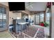 Covered patio with seating area, outdoor bar and grill, perfect for entertaining at 505 8Th S St, Dundee, FL 33838