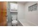Renovated bathroom with modern fixtures and a combined shower and bathtub at 5102 Village Ct # E-2, Lake Wales, FL 33898