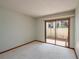 Bedroom with sliding glass doors leading to an outdoor patio or balcony at 5102 Village Ct # E-2, Lake Wales, FL 33898