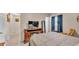 This bedroom features a fireplace, neutral-tone walls, and tile flooring at 616 Oriole Dr, Lakeland, FL 33803
