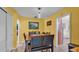 Bright dining room with wood table, pendant lighting, and access to other rooms at 616 Oriole Dr, Lakeland, FL 33803