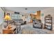 Comfortable living room with soft, oversized seating, decorative rug, and bright, natural light at 616 Oriole Dr, Lakeland, FL 33803