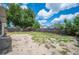 Backyard featuring a privacy fence, providing ample space for outdoor activities and landscaping at 630 Heather Glen Loop, Winter Haven, FL 33884