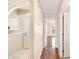 Entryway featuring tile flooring, an arched window, and views of the adjacent living spaces at 630 Heather Glen Loop, Winter Haven, FL 33884