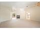 Spacious living room with a fireplace, high ceilings, and a neutral color palette at 630 Heather Glen Loop, Winter Haven, FL 33884