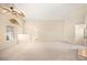 Open living space with high ceilings, a neutral palette, and seamless flow to other rooms at 630 Heather Glen Loop, Winter Haven, FL 33884