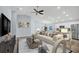 Stylish living room featuring modern furniture and an open floor plan at 648 Lorient Dr, Eagle Lake, FL 33839
