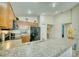 Bright kitchen with a breakfast bar and stainless steel appliances, perfect for preparing meals and entertaining at 713 Overlook Grove Dr, Winter Haven, FL 33884
