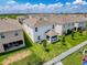 Bird's-eye view of home showing large backyard and covered patio at 912 Scrub Oak Hammock Rd, Davenport, FL 33837