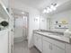 Bathroom featuring double sinks, tiled floor and a separate shower/tub at 912 Scrub Oak Hammock Rd, Davenport, FL 33837