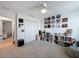 Bedroom with carpet, ceiling fan, closet, and decor shelves at 912 Scrub Oak Hammock Rd, Davenport, FL 33837