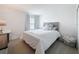 Bedroom with a bright window, neutral carpet, white walls, and ample natural light at 912 Scrub Oak Hammock Rd, Davenport, FL 33837