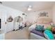 Comfortable bedroom with a vanity, ceiling fan, and decor accents at 912 Scrub Oak Hammock Rd, Davenport, FL 33837