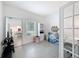 Bonus room with tile flooring, window, and versatile space for recreation or home office at 912 Scrub Oak Hammock Rd, Davenport, FL 33837