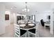 Dining room featuring a decorative chandelier and plenty of natural light at 912 Scrub Oak Hammock Rd, Davenport, FL 33837