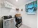 Practical laundry room with modern appliances and window at 912 Scrub Oak Hammock Rd, Davenport, FL 33837