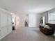Comfortable loft with a cozy armchair and built-in cabinets at 912 Scrub Oak Hammock Rd, Davenport, FL 33837